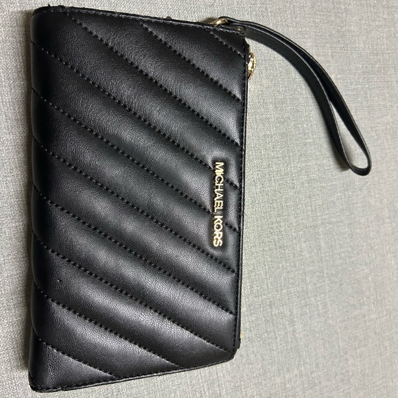Michael Kors Handbags - Michael Kors Black Quilted Wristlet with Gold Accents